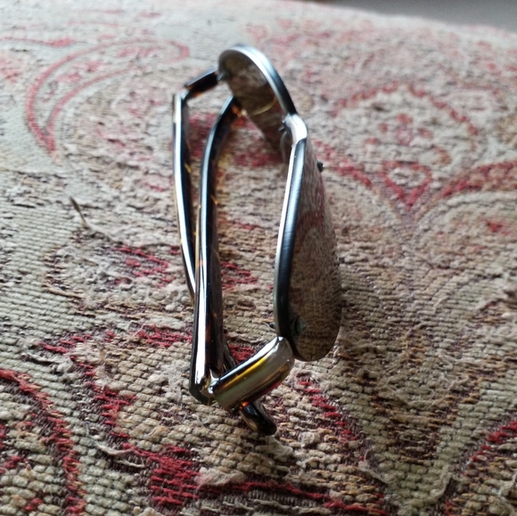 PRADA Sunglasses Model:PRADA SPR 10B Frame Color:Brushed Matte Silver Tortoise - Picture 6 of 13